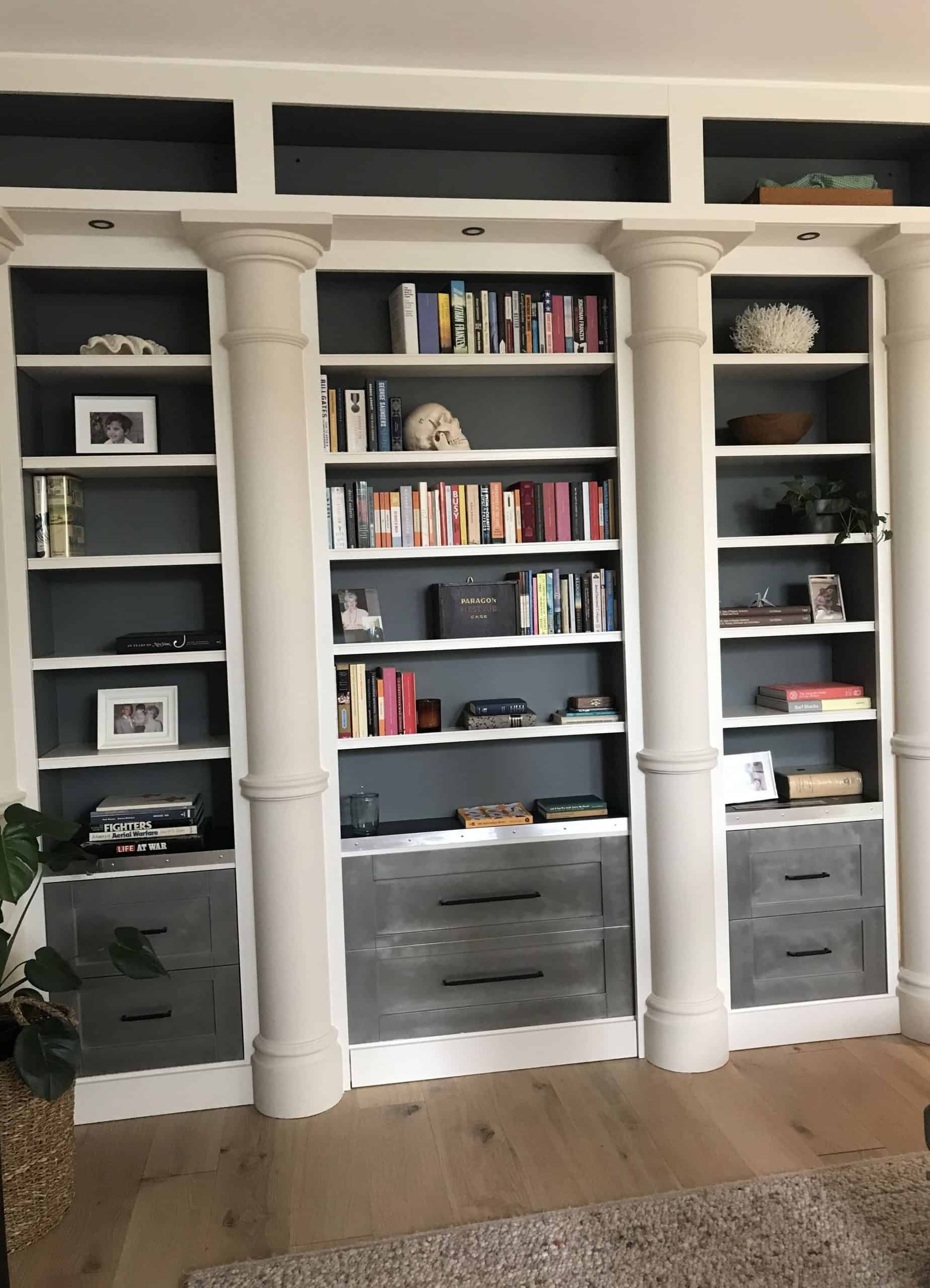 A bookcase that is actually a hidden door, by Groth & Sons
